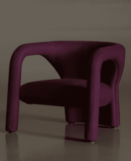 A compact, rounded lounge chair, upholstered in a deep magenta fabric, featuring a distinctive, sculptural silhouette with thick, continuous armrests and a low-slung seat. — 3D model