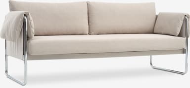 A close-up view of a sofa, focusing on the backrest and seat. The sofa features a tubular metal frame, likely chrome-plated steel, with a light-colored fabric upholstery. The backrest appears to be composed of two cushions, while the seat is a single upholstered panel. The overall design suggests a modern or Bauhaus-inspired aesthetic. — 3D model