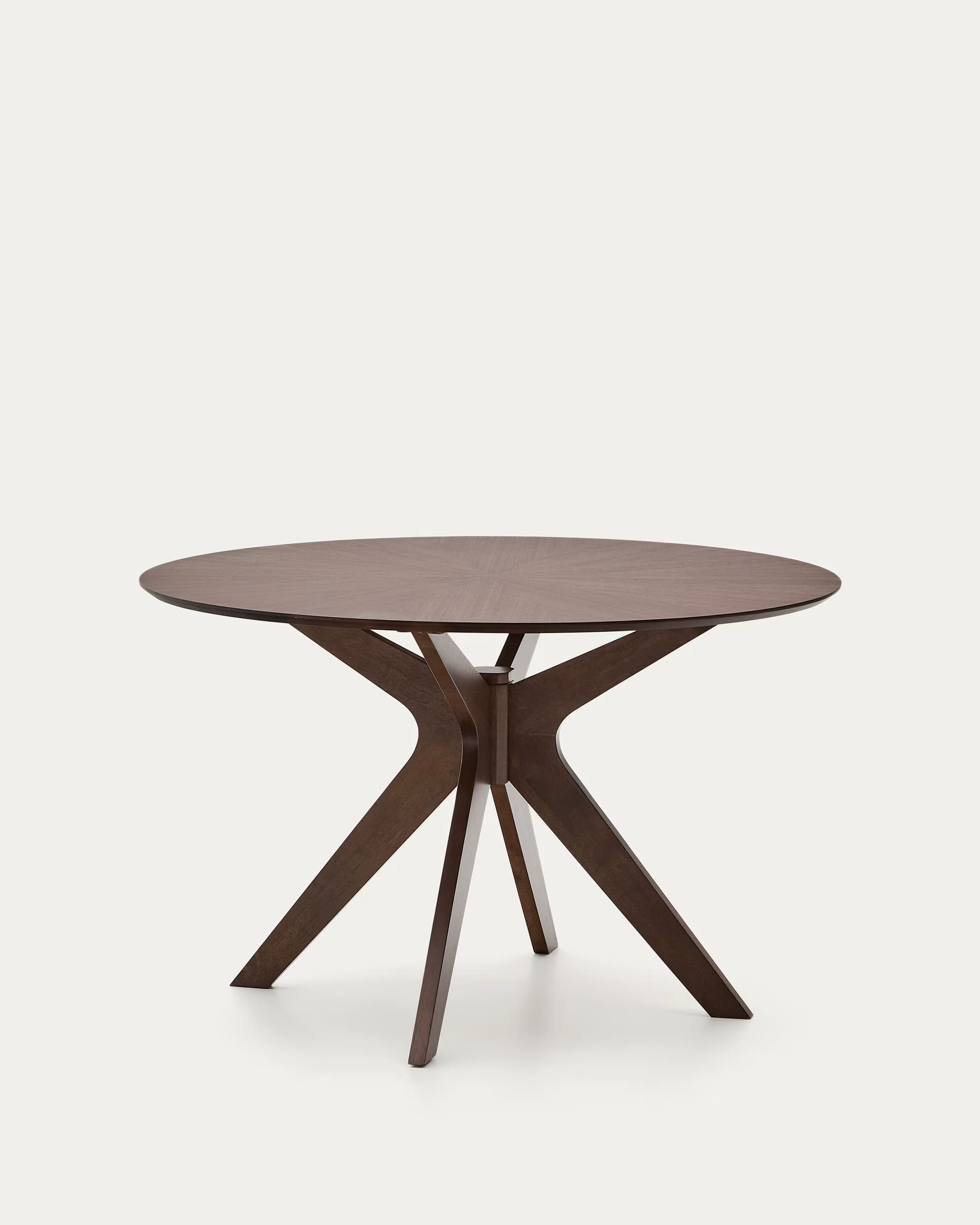 A round dark wood table featuring a striking pedestal base. The base consists of multiple angular and curved wooden elements that converge centrally, providing stability and a modern, sculptural aesthetic. The tabletop appears to have a subtle radiating wood grain pattern. — 3D model