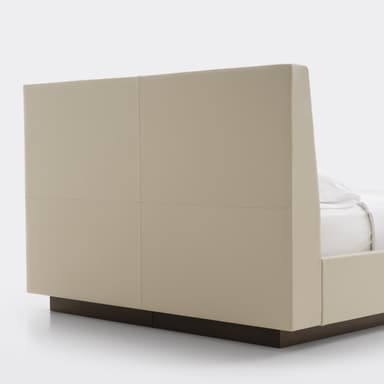 A modern upholstered platform bed with a padded headboard and a floating-effect base. — 3D model