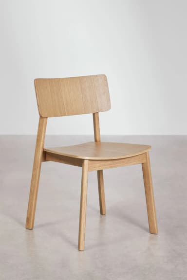 A minimalist dining chair crafted from light-toned natural wood, featuring a simple, clean-lined design with a gently curved seat and backrest. — 3D model
