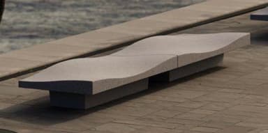 A long, single-person chaise lounge constructed from a gray, textured, stone-like material, likely concrete or a similar composite. The lounge features an undulating, ergonomic surface designed for reclining comfort, and appears to be composed of two distinct sections that fit together to form the complete piece. It has a minimalist, sculptural aesthetic. — 3D model