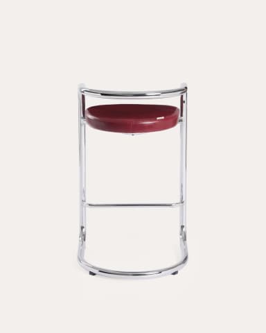 A high bar stool featuring a gleaming tubular chrome frame and a curved, red upholstered seat and backrest. The frame forms a continuous loop from the base, extending upwards to create armrests and a partial back support. The design is sleek and minimalist, characteristic of the Bauhaus and modernist aesthetic. — 3D model