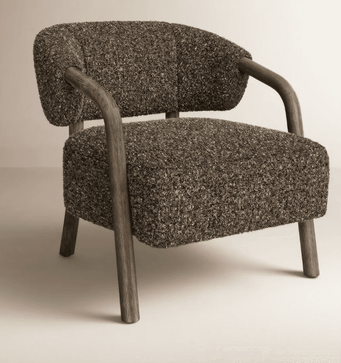 A contemporary accent chair featuring a chunky, textured dark grey and brown bouclé-like upholstery for the seat and backrest. The chair is supported by a curved, exposed wooden frame that forms the armrests and extends downwards to become the four tapered legs. The wood has a dark, muted finish, complementing the fabric. — 3D model