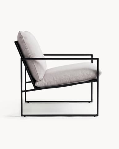 A contemporary armchair with a minimalist design. It features a thin, dark metal frame that forms the base, legs, and armrests. The seat and back are upholstered with thick, light grey cushions. — 3D model