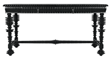 A sculptural black wood desk featuring a rectangular top, a finely fluted or reeded apron with two drawers, and four robust spiral-turned (spool) legs connected by a matching stretcher. The drawers are equipped with small brass ring pull handles. The entire piece is finished in black. — 3D model