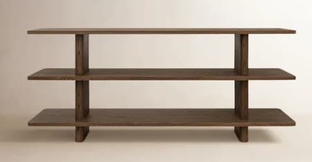 A low, wide, three-tiered shelving unit crafted from dark-stained wood, likely oak. It features a minimalist design with thick, rectangular shelves supported by integrated vertical planks that also form the base. The construction emphasizes clean lines and a sturdy, open-back form factor suitable for display and storage. — 3D model