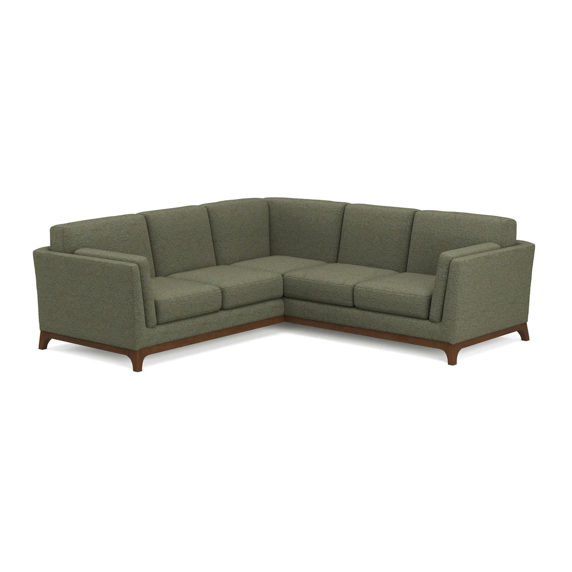 A contemporary L-shaped sectional sofa upholstered in olive green fabric, featuring a minimalist design with an exposed dark wooden frame and tapered legs. — 3D model