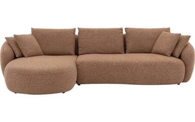 A contemporary, curved sectional sofa upholstered in a warm tan boucle fabric, featuring a flowing, organic silhouette and loose back cushions. — 3D model