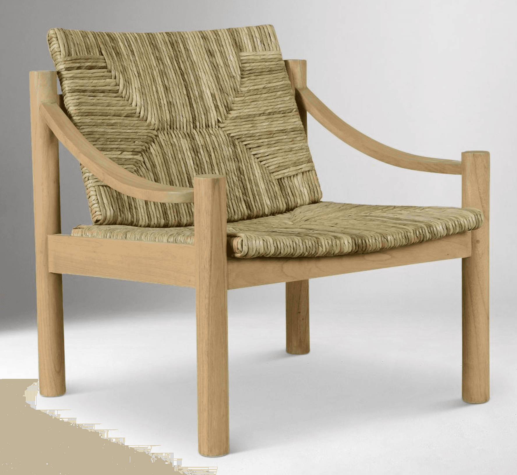 A low-profile lounge chair featuring a sturdy light-toned solid wood frame and a seat and backrest crafted from natural woven rush or similar plant fibers. The armrests are gently curved, connecting the front and back uprights. The weaving displays a distinct pattern, contributing to an organic and textured aesthetic. The chair's design emphasizes natural materials and clean, minimalist lines. — 3D model