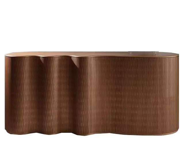 A credenza with a fluted, wavy design on its front facade. It has a smooth, slightly curved top surface. The overall form is elegant and contemporary. — 3D model