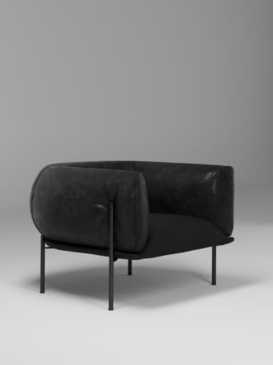 A contemporary armchair with a low profile, featuring a rounded, enveloping back and armrests. The upholstery has a textured appearance, suggesting leather or a high-quality fabric. It is supported by four slender, dark-colored legs that elevate the seat from the floor. — 3D model