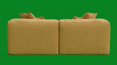 A contemporary light gray two-seater sofa, composed of two modular sections, featuring a low profile and plush, inviting design. It has wide arms and backrests, complemented by multiple loose back cushions and accent pillows, all upholstered in a textured fabric with visible piping along the seams. — 3D model