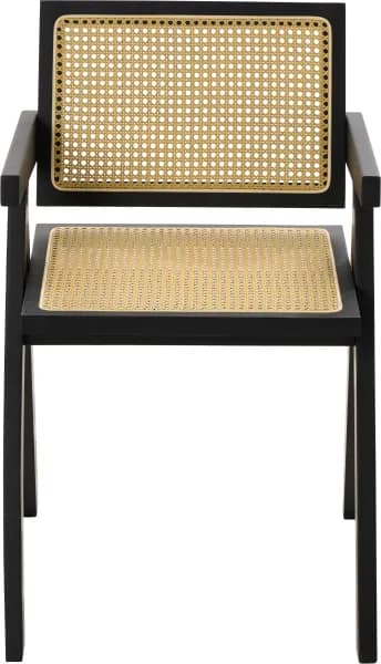 A modern armchair with a black wooden frame and cane weaving for the seat and backrest. The armchair features a distinctive angular design with a sloped backrest and armrests, supported by four angled legs. — 3D model