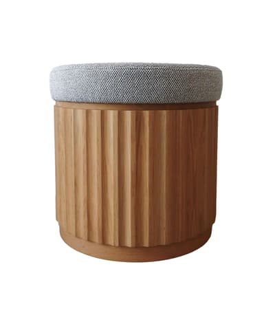A contemporary round ottoman featuring a distinctive fluted oak wood base and a grey textured upholstered top. The wood grain is visible, and the fluted design adds a textural element to the base, while the fabric top provides a comfortable, cushioned surface. — 3D model