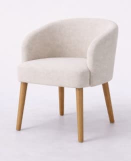 A compact, modern upholstered armchair featuring a rounded backrest that seamlessly flows into integrated armrests. The chair is covered in a light-colored, textured fabric and supported by four splayed, tapered wooden legs. — 3D model
