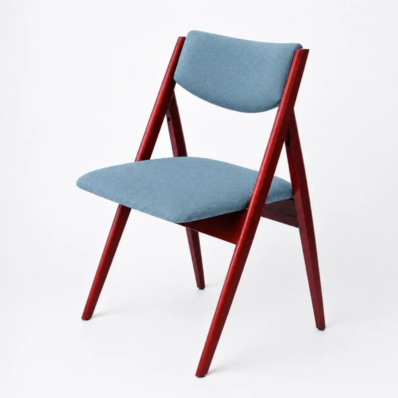An armless chair featuring a reddish-brown stained wooden frame with a light blue upholstered seat and backrest, characterized by its angled and tapered legs. — 3D model