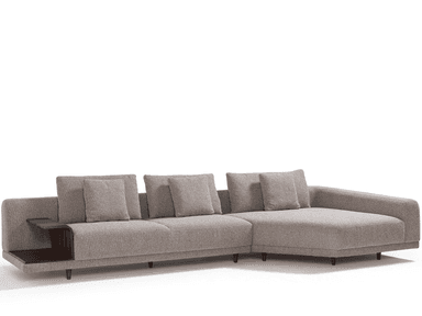 A modern sectional sofa with a chaise lounge on the right side. It features a low profile with upholstered cushions and a textured fabric. An integrated dark wood side table with a shelf is attached to the left end of the sofa. — 3D model