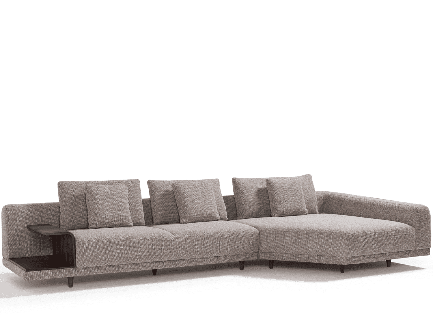 A modern sectional sofa with a chaise lounge on the right side. It features a low profile with upholstered cushions and a textured fabric. An integrated dark wood side table with a shelf is attached to the left end of the sofa. — 3D model