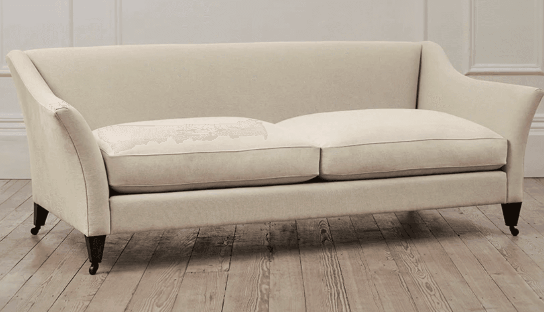A two-seater sofa upholstered in a light beige or off-white fabric. It features a classic design with gently flared, slightly rolled arms and a tailored back. The sofa has two individual seat cushions with piped edges. It stands on four visible dark, turned wooden legs, each equipped with a brass or dark metal caster wheel. — 3D model