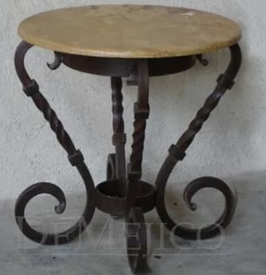 A round-top side table with a cream-colored, possibly stone or composite, surface. The base is constructed from dark brown wrought iron, featuring twisted columnar legs that transition into decorative scrollwork near the floor. The design suggests a rustic or traditional aesthetic. — 3D model