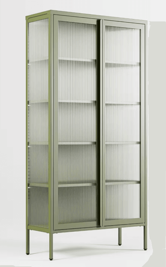 A tall, slender cabinet with a sage green metal frame, featuring three interior shelves. The front is composed of two sliding doors with fluted glass inserts, and the sides also have fluted glass panels. It stands on four slender metal legs. — 3D model