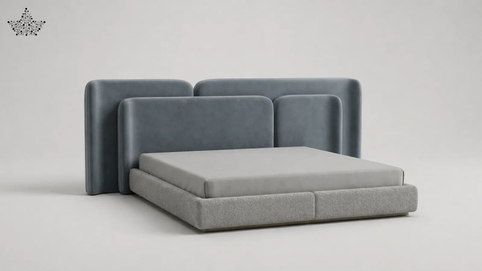 A modern platform bed featuring a low-profile upholstered frame and a distinctive modular headboard composed of several individual padded panels. The bed frame is covered in a light grey, textured boucle-like fabric, while the headboard panels are upholstered in a smooth, darker blue-grey fabric, possibly velvet or a soft textile. The headboard panels exhibit rounded corners, contributing to a contemporary and inviting aesthetic. A light grey mattress is positioned within the frame, which itself rests on a recessed plinth base. — 3D model