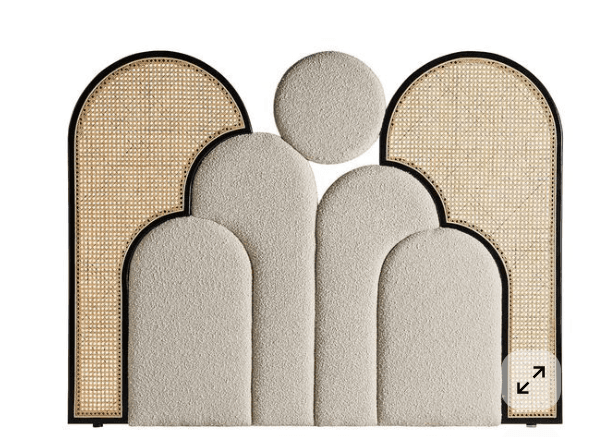 A contemporary headboard with an Art Deco-inspired design, featuring a dark wood frame, light cane rattan panels, and cream boucle upholstered sections arranged in a geometric, scalloped pattern. — 3D model