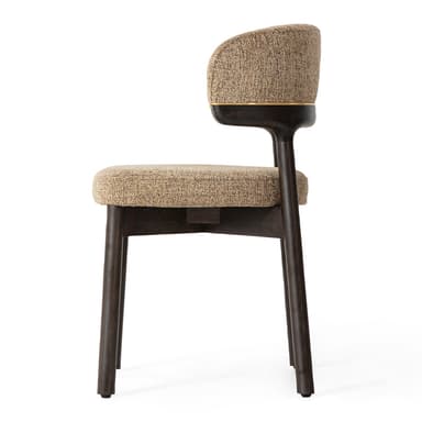 A modern upholstered chair with a dark wood frame. The seat and backrest are covered in a textured, light brown fabric. The backrest has a curved shape and is accented with a thin gold trim along the top edge. The frame is composed of four legs and a structural element supporting the backrest, all finished in a dark, possibly walnut or ebony, wood. — 3D model