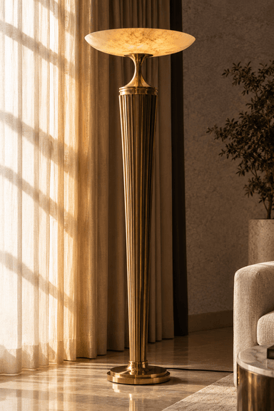 A tall, slender pedestal table featuring a fluted brass column and a shallow, dish-shaped alabaster top. The base is circular and stepped, matching the brass finish of the column. The design exhibits clear Art Deco influences with its geometric lines and luxurious materials. — 3D model