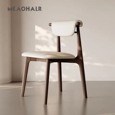 A modern armless dining chair featuring a curved, padded backrest and seat upholstered in white, supported by a dark wood frame with slender, tapered legs. — 3D model