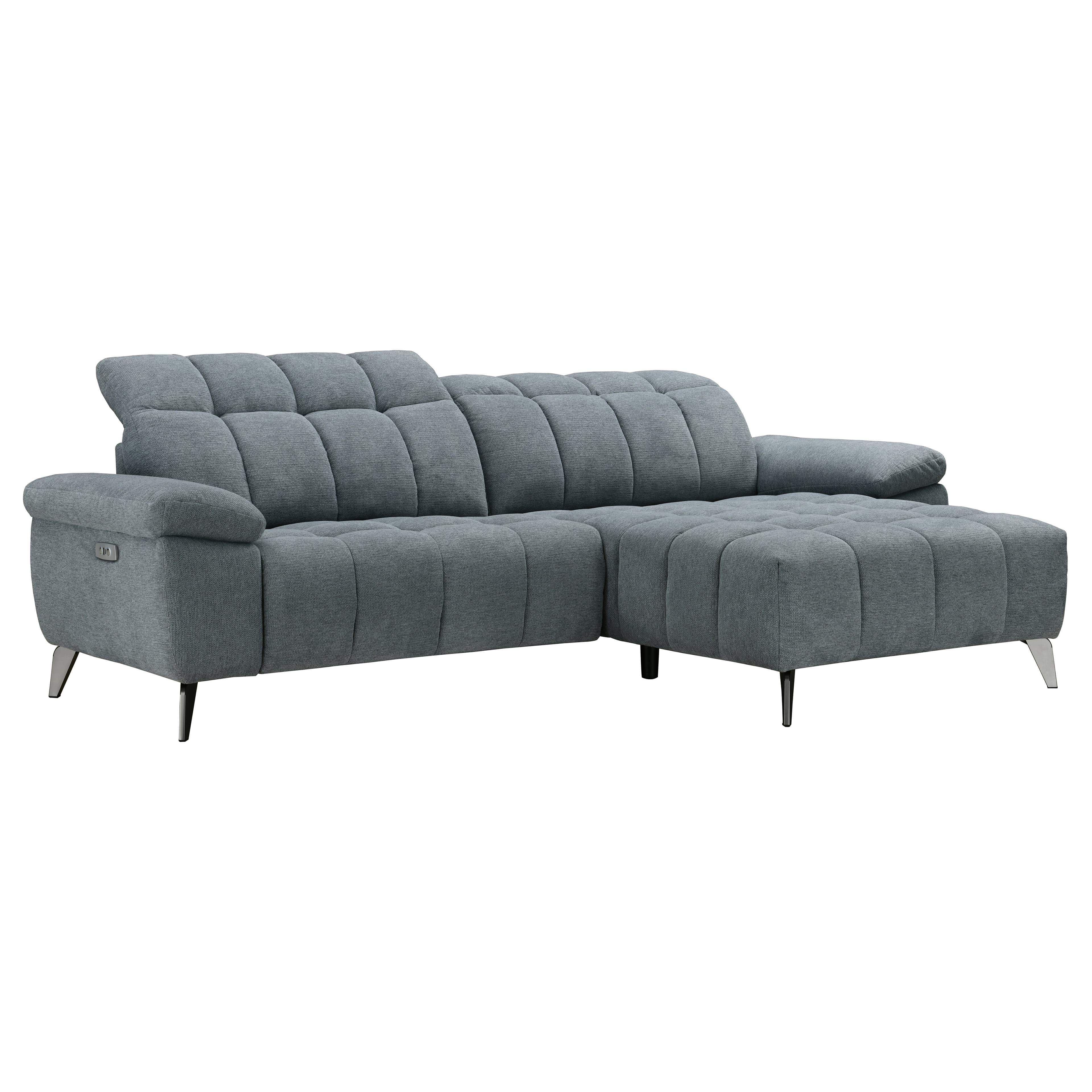 A contemporary grey fabric sectional sofa featuring a chaise lounge on one end and a reclining function indicated by a control panel on the armrest. The sofa is upholstered with channel tufting on the seat and back cushions, supported by slender, angled metal legs. — 3D model