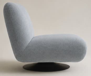 A contemporary armless swivel lounge chair upholstered in a light blue-gray fabric, featuring a low profile and a comfortable, rounded form resting on a black circular swivel base. — 3D model