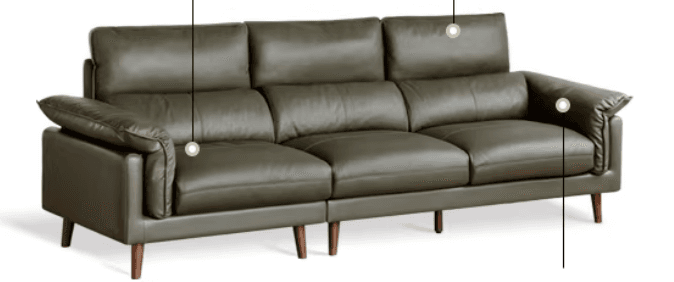 A three-seater sofa with plush, tufted cushions and a low profile. The sofa features a contemporary design with clean lines and slightly rounded arms. It is supported by four tapered wooden legs. — 3D model