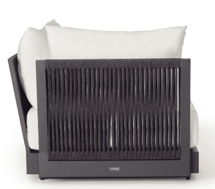 A contemporary outdoor lounge chair featuring a dark grey powder-coated metal frame and a distinctive woven rope backrest. It is equipped with thick, light-colored upholstered cushions for comfort and a modern aesthetic. — 3D model