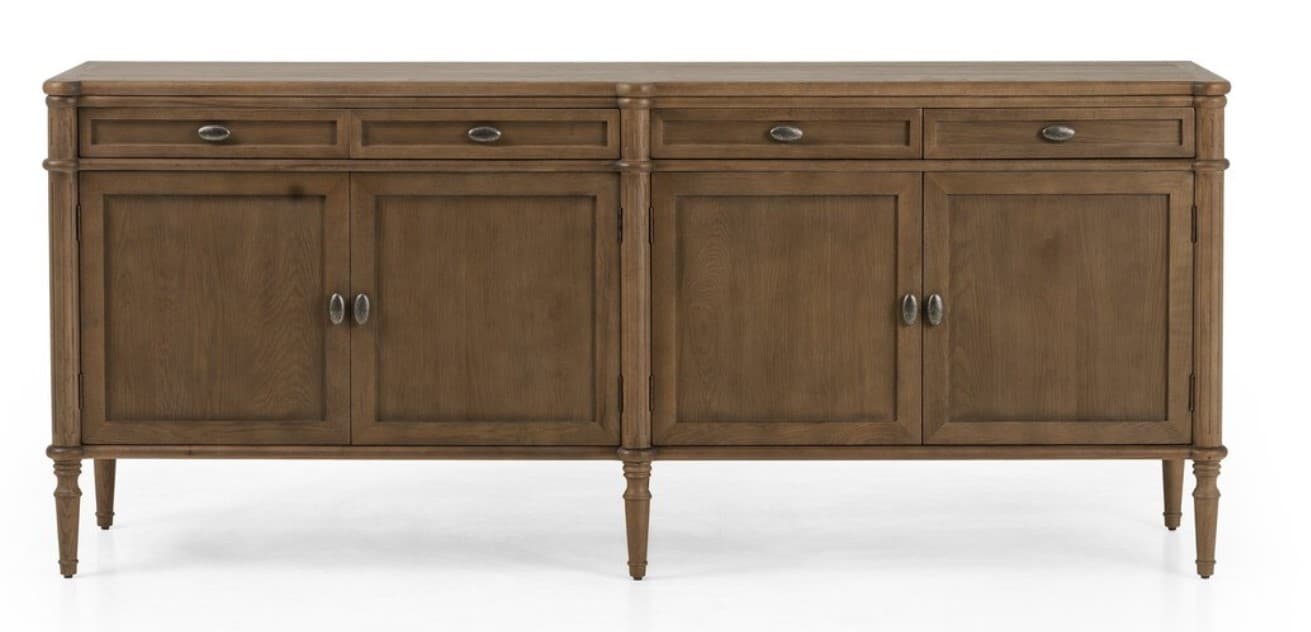 A long, rectangular sideboard with a flat top, featuring four cabinet doors and four drawers arranged above the doors. The piece is supported by four turned legs. Each drawer has a single metal pull, and each pair of cabinet doors shares two metal pulls. The wood grain is visible, and decorative molding frames the drawers and doors. — 3D model