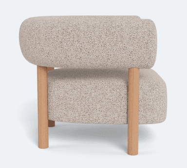 A single accent chair featuring a rounded, enveloping backrest and seat upholstered in a textured, light-colored boucle or similar fabric. The chair is supported by a minimalist frame constructed from light-toned wood, with four cylindrical legs extending from the base and two upright supports that integrate into the armrests and connect to the backrest. The design blends soft, organic curves with a clean, natural material aesthetic. — 3D model