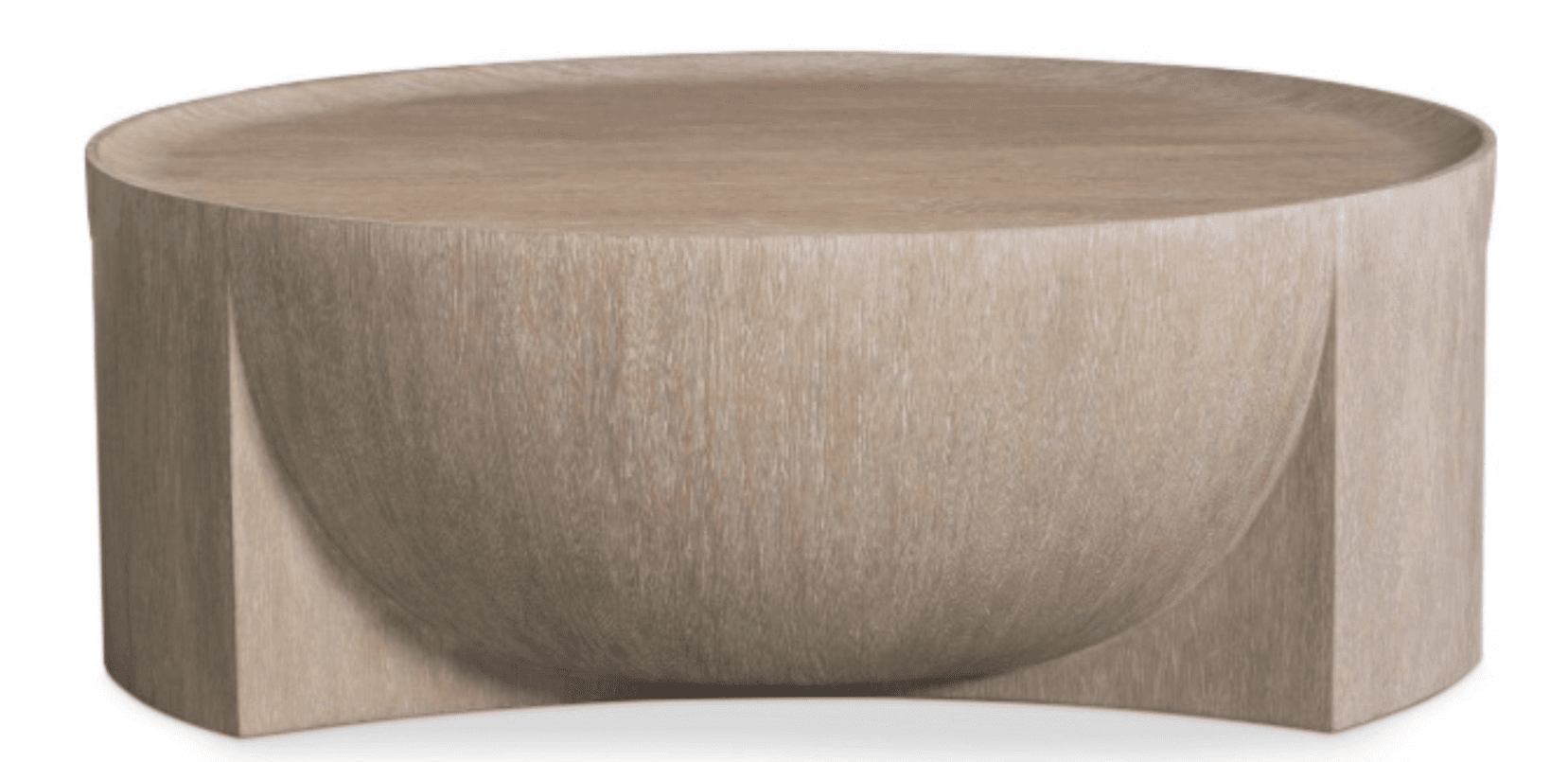 A contemporary coffee table with a rounded, drum-like base featuring a carved-out concave section. The tabletop is flat and circular with a slightly raised edge. The entire piece exhibits a light, weathered wood grain finish. — 3D model