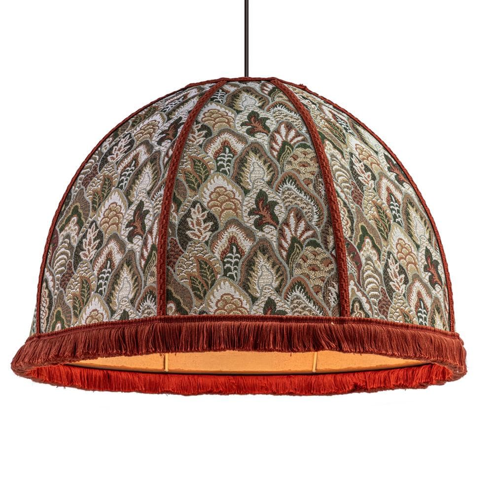 A domed pendant lampshade featuring a richly patterned textile surface. The fabric displays an intricate jacquard weave with stylized foliage and floral motifs in shades of green, brown, beige, and off-white. The lampshade is segmented by vertical orange-red braided trim, and its bottom edge is adorned with a matching orange-red fringe. — 3D model