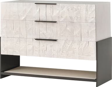 A dresser with three drawers. The drawer fronts have a distinctive textured, carved wood pattern in a light, almost white finish. The body of the dresser appears to be constructed from wood with a similar light finish. It is supported by a dark metal base which also incorporates an open shelf beneath the drawers. The drawer handles are slim and black. — 3D model
