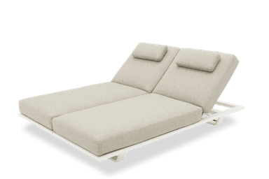 A contemporary dual chaise lounge featuring two independently adjustable backrests, each with a small head pillow. It is supported by a sleek white metal frame and upholstered in a light greige textured outdoor fabric. — 3D model