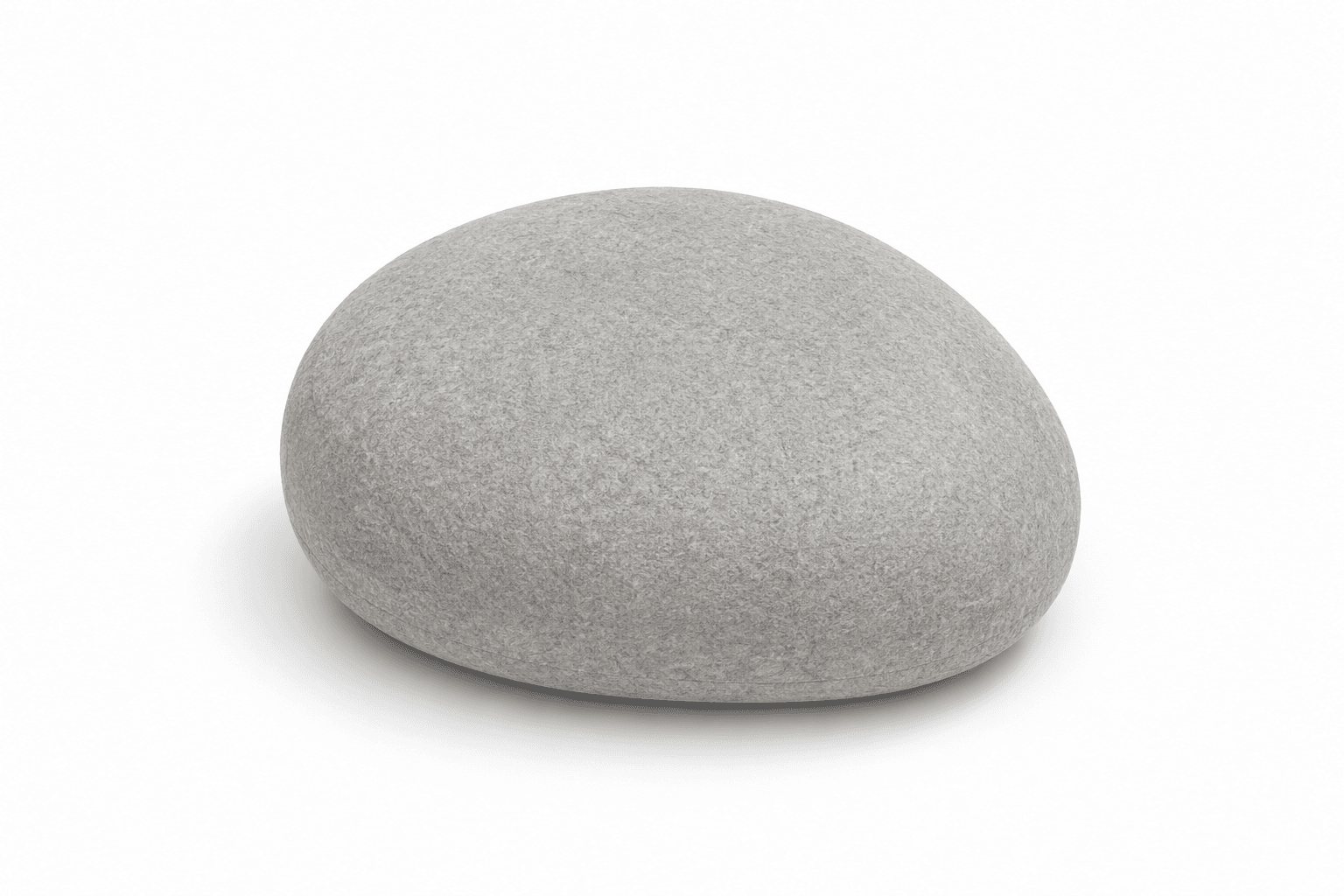 A light gray, pebble-shaped floor ottoman with a soft, upholstered texture, presented against a clean white background. The piece features a smooth, rounded form, mimicking a large river stone. Its surface is uniformly covered in a light gray fabric, suggesting felt or a similar textile, with no visible seams or distinct edges. — 3D model