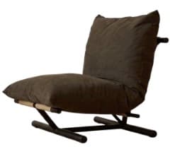A low-profile contemporary lounge chair featuring a dark brown or charcoal fabric cushion set on a black metal sled-style frame. The chair has a relaxed, reclined posture, with thick, plush cushions forming the seat and backrest. Light-colored straps, possibly leather or canvas, are visible supporting the front edge of the seat cushion on the frame. The frame consists of horizontal bars connected by angled supports, creating a minimalist yet sturdy base. — 3D model