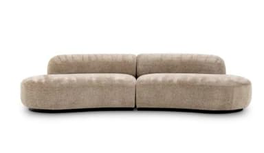 A contemporary, upholstered sofa with a sinuous, organic shape. It features a low profile, rounded arms that flow into the backrest, and a segmented seat that follows a curved contour. The upholstery has a textured, woven appearance. — 3D model