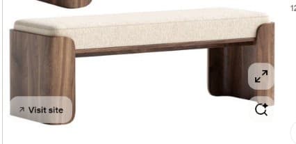 A modern bench featuring a dark wood, U-shaped frame and a light-colored upholstered cushion. The design is minimalist with clean lines and rounded edges. — 3D model