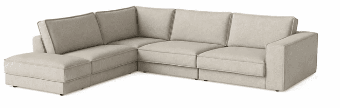A large, modular L-shaped sectional sofa upholstered in a light beige, textured fabric. It features a left-facing chaise lounge, multiple individual seat and back cushions with piped edges, and low-profile track arms, indicative of a modern design. — 3D model