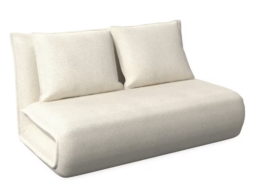 A contemporary armless loveseat upholstered in a textured off-white boucle fabric, featuring a low-profile, monolithic design with soft, rounded edges. It includes two loose, square back cushions for added comfort. — 3D model