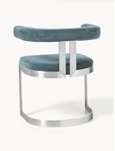 A modern armchair with a metal frame and upholstered seating. The armchair features a curved, open armrest design, a rectangular seat cushion, and a curved sled base. The frame appears to be made of polished metal, possibly stainless steel or aluminum, with a brushed finish. The upholstery is a textured fabric in a deep teal or blue-green hue. — 3D model