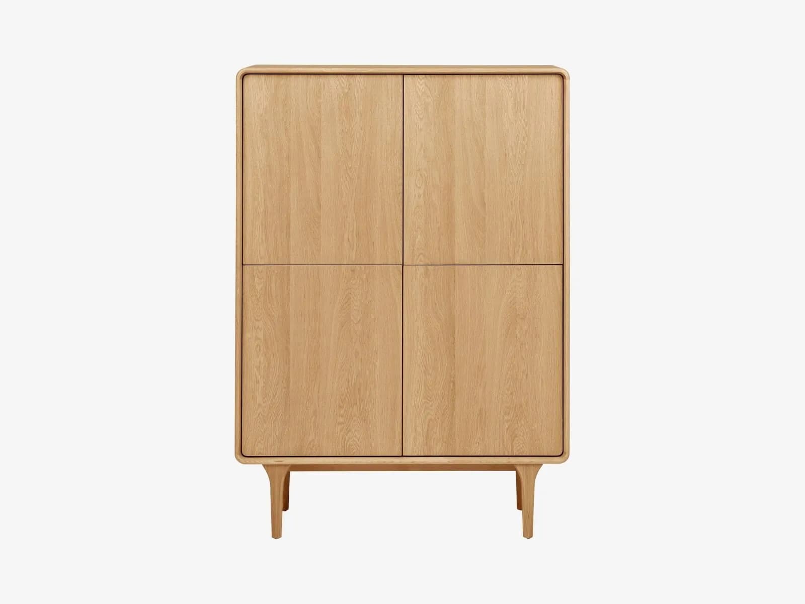 A freestanding, light-toned wooden storage cabinet featuring four solid doors arranged in a two-by-two configuration. The cabinet has gently rounded corners on its top and sides and stands on four splayed, tapered legs that are integrated into a plinth-like base. — 3D model