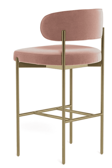 A modern bar stool featuring a rounded upholstered backrest and a padded seat cushion, both covered in a dusty rose velvet fabric. The frame is constructed from slender, tubular metal with a golden or brass finish, incorporating an integrated rectangular footrest. The design is sleek and minimalist, suitable for contemporary interiors. — 3D model